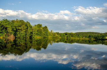 Obraz na płótnie Canvas Mountain Lake with blue mountains in the background