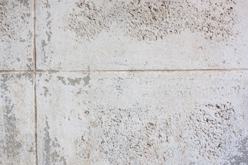Dirty concrete block wall background.