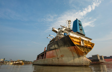 Partially broken down ocean ship at a shipbreaking yard in Chittagong, Bangladesh