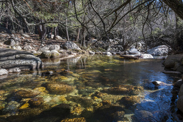 The River Manzanares along its course through La Pedriza, in Guadarrama Mountains National Park, Madrid, Spain