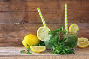 fresh mojito at the bar on a rustic wooden table