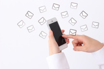 human hand using smartphone on white background