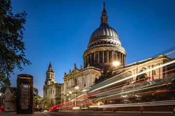 Fototapeta na wymiar St Paul’s cathedral at night with traffic creating light trails