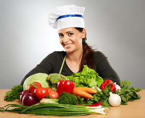 Woman cook with vegetables