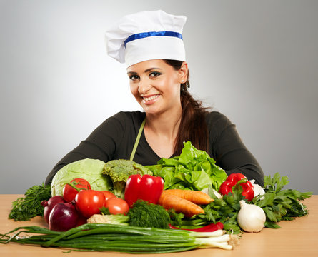 Woman cook with vegetables