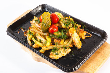 Roasted potatoes in the frying pan