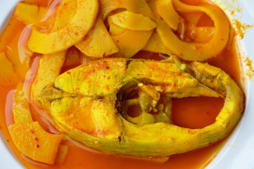 boiled red mango fish with pickled bamboo shoot in spicy and sour soup