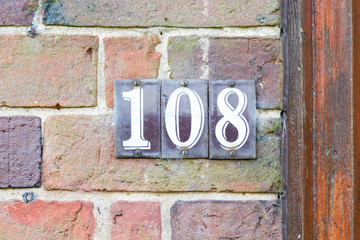 House Number 108 sign - obrazy, fototapety, plakaty