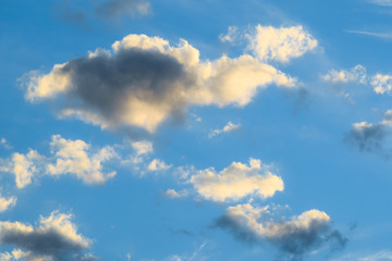 Fototapeta na wymiar Clouds developing into a storm on a blue sky background