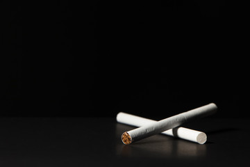 cigarettes on a black background