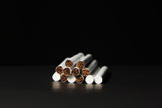 cigarettes on a black background