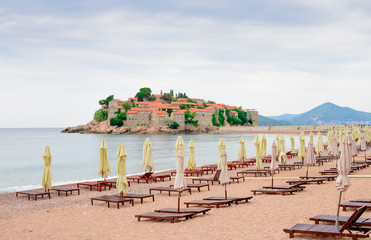 Luxury Sand Beach near Island and Resort Sveti Stefan, Montenegro. Balkans, Adriatic sea, Europe.