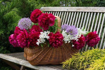 Fototapeta na wymiar Basket with flowers.