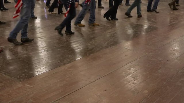 People dancing western dance at a country folk festival