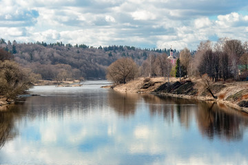Moscow River and the church on the shore in the early spring on
