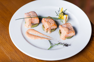 Fried salmon on plate