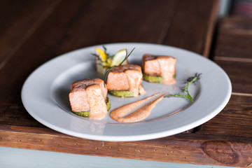 Fried salmon on plate