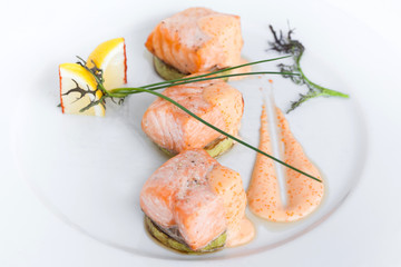 Fried salmon on plate