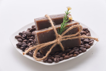 Composition with grains of coffee, soap and decorative objects