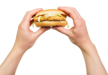 In female hands  hamburger isolated on white background.