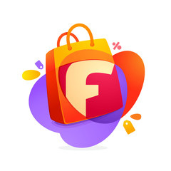Fototapeta premium F letter with shopping bag icon and Sale tag.