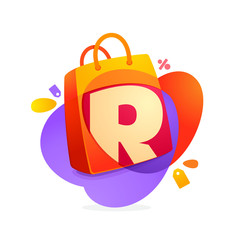 R letter with shopping bag icon and Sale tag.