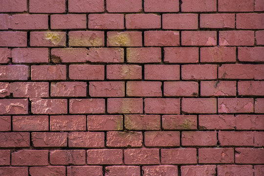 Pared de ladrillo de una f&aacute;brica o almac&eacute;n. Muro urbano y callejero para pintar grafitis en un parque o en los suburbios de la ciudad.