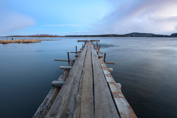 Fototapeta premium old wooden pier on the lake