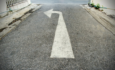 Obraz premium White arrows on the street