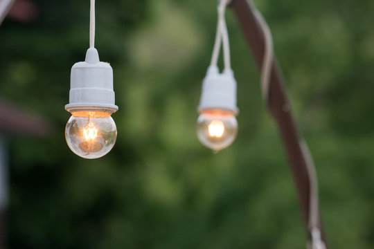 Hanging light bulb in outdoor