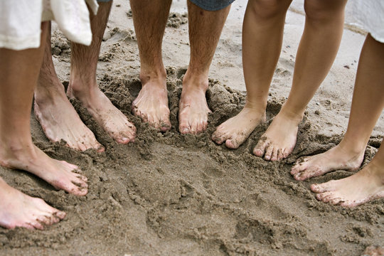 Feet on the beach, Ljustero, Stockholm archipelago, Sweden.