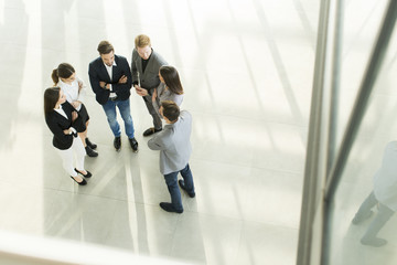 Young people in the office photographed from above