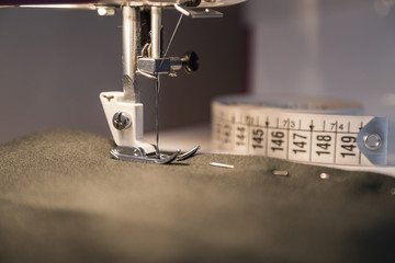 the sewing process at the stage of needle stitching
