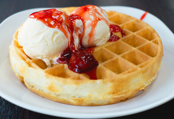 strawberry waffle with vanilla ice cream,selective focus