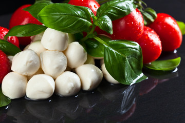 mozzarella with basil and tomatoes