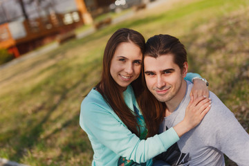 Happy young couple in love meeting in the autumn park