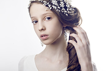beautiful young fashion model with accessories on the head