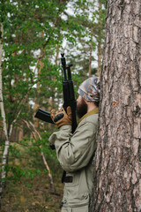 Armed man in a zone of armed conflict