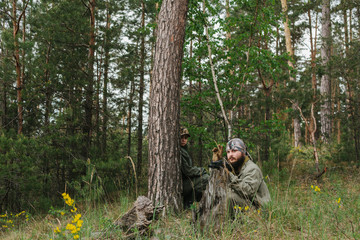 armed men in the area of armed conflict