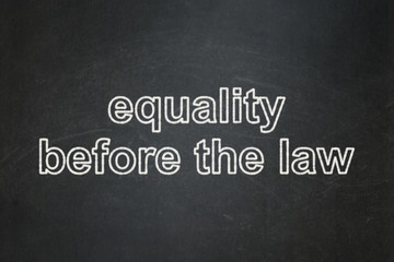 Obraz premium Political concept: Equality Before The Law on chalkboard background