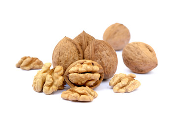 Fresh walnuts with a shell isolated on white background