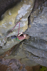 A bold child is climbing.