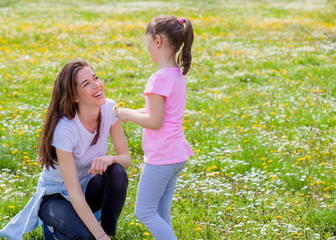 Mother with daughter in park
