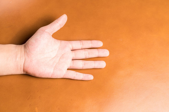hands on leather background

