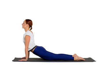 sports exercise isolated on white background. Beautiful woman dressed in sportswear, trains flexibility of the body.