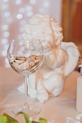 Angel and wedding rings in the glass 6158.