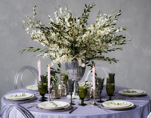 Wedding decoration for table for six person on banquet,  olive tree