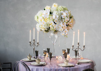 Wedding decoration for banquet with orchids and candles