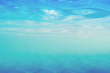Fototapeta na wymiar Blurred sea shallow underwater background