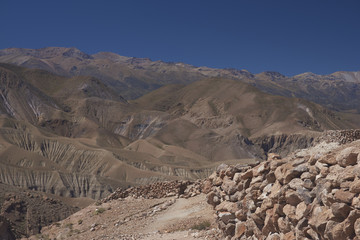 Archaeological site with remains of the historic fortress of Pukara de Copaquilla in the Andes Mountains of northern Chile.